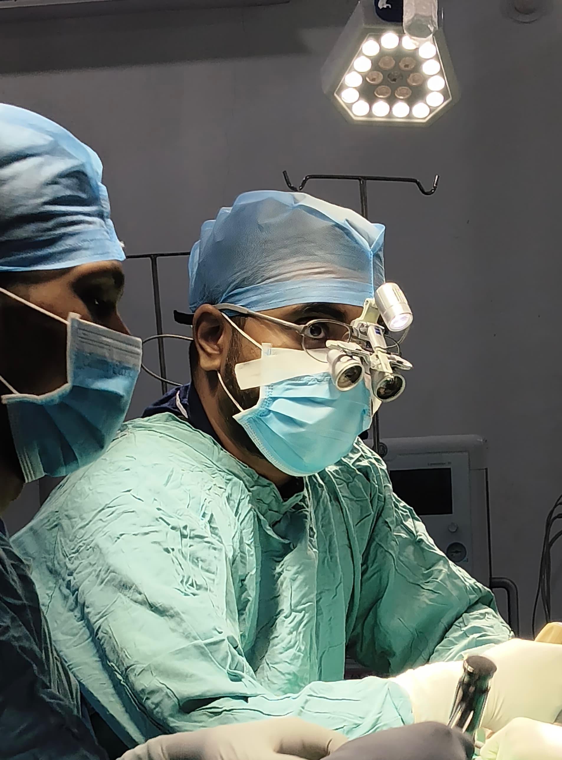 Spine surgeon focused in the operating room